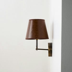 Aged Brass Finish and Leather Lampshade Sconce