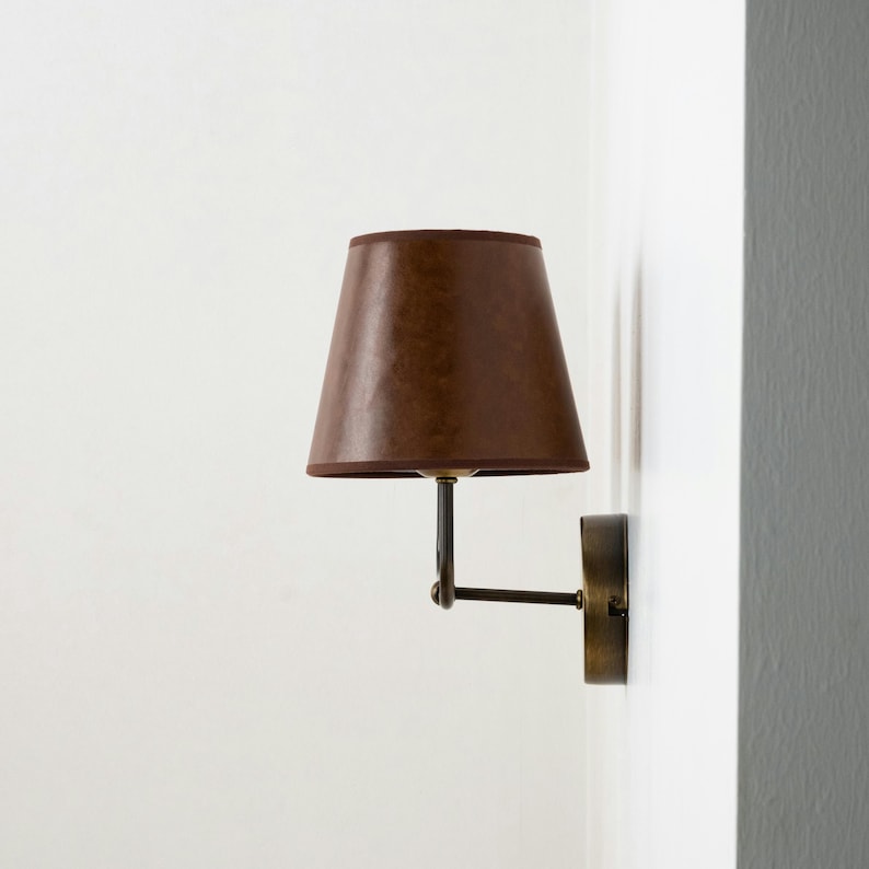 Aged Brass Finish and Leather Lampshade Sconce