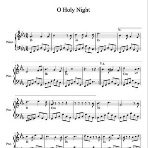 以下が含まれることがあります： ピアノ曲「O Holy Night」の楽譜。タイトルが上にあり、音符、音部記号、調号などの音楽表記があります。B、Ab、Gmなどのコードも表示されています。