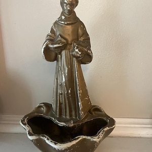 St Francis Statue Planter. Weathered Gold Paint With White Ceramic Underneath.