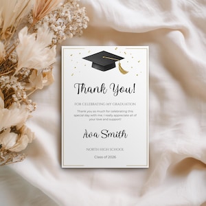 May include: A graduation thank you card with a black mortarboard and gold tassel illustration. The card reads "Thank You!" and includes the graduate's name, school, and class year. The card is on a white background with gold confetti.