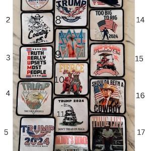 May include: A collection of 18 iron-on patches featuring various designs and slogans related to the 2024 presidential election. The patches are square and have a white background with black borders. Some of the designs include a train, a snake, a cowboy, and a bald eagle. The slogans include "Trump's Snowflake", "Too Big to Rig", "Truth Really Upsets Most People", "Fierce The Don", "Shoulda Been a Cowboy", "Don't Tread on MAGA", "Daddy's Home", "I'll Be Home for Christmas", and "Trump 2024".