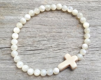 Renewed. Prayer Bracelet. Mother of Pearls beaded stretch cross bracelet.