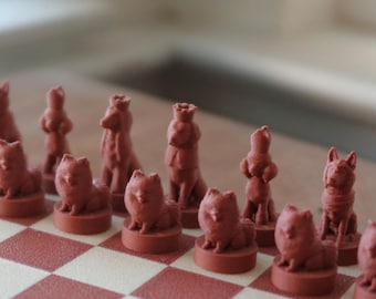 May include: A set of terracotta-colored chess pieces shaped like various dog breeds, including seated and standing figures, arranged on a checkered board with alternating terracotta and cream-colored squares.