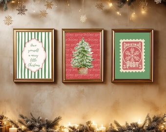 May include: Three framed Christmas art prints. One features green and white stripes with the text "Have yourself a merry little Christmas." Another shows a Christmas tree on a red background. The third is a green stamp design.