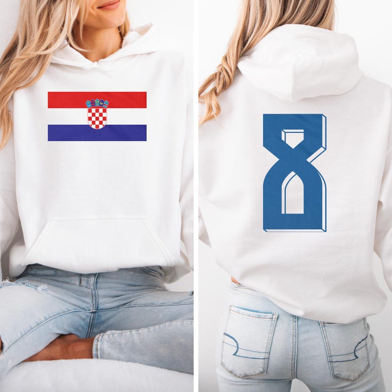 A woman wearing a white hoodie with the Croatia national flag and the number 8 on the back.