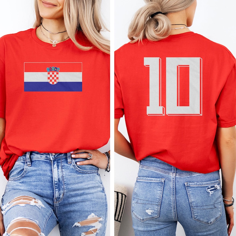 A woman wearing a red t-shirt with the Croatia national flag and the number 10 on the back.