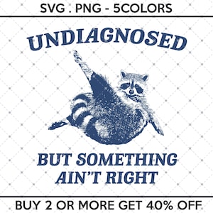 May include: A blue and white illustration of a raccoon with the text "UNDIAGNOSED BUT SOMETHING AIN'T RIGHT" and "BUY 2 OR MORE GET 40% OFF".