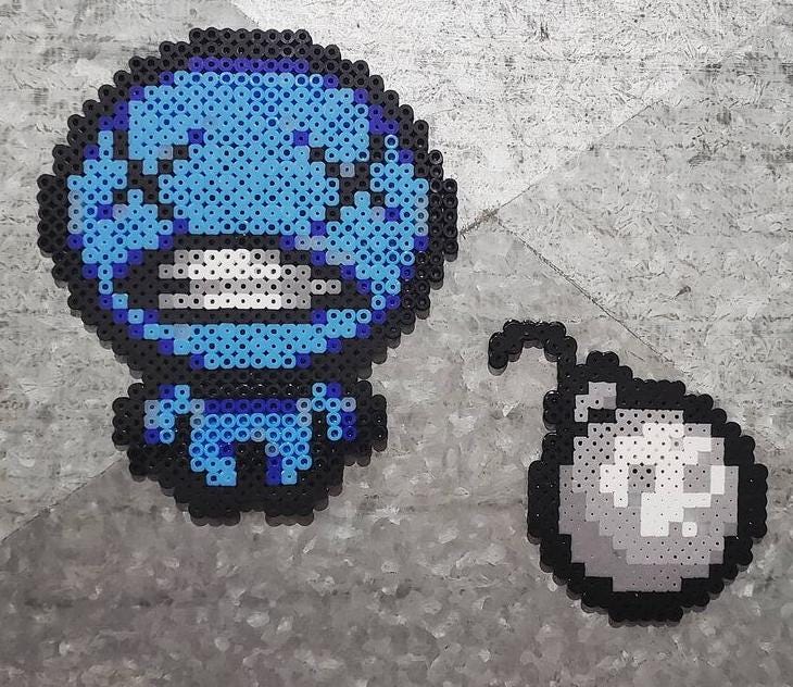 The Binding of Isaac Blue Baby and Bomb Magnet Set