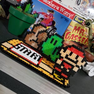 Super Mario 3 en el mundo 1 (tierra de pasto)