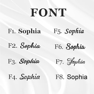 Puede incluir: Imagen que muestra ocho estilos de fuente diferentes, cada uno mostrando el nombre "Sophia". La palabra "FONT" est&aacute; en la parte superior. Las fuentes var&iacute;an en estilo, desde cl&aacute;sico hasta m&aacute;s decorativo, ofreciendo una gama de opciones de dise&ntilde;o.