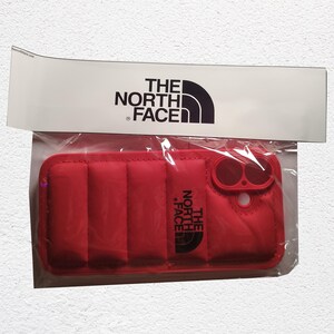 The North Face - Puffer Jacket - Coque Rouge pour Apple Iphone 16 - Neuve