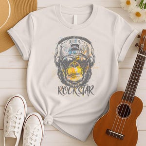 Chemise Rockstar - T-shirt graphique Gorilla Headphones - Design rock and roll vintage - Cadeau parfait pour les amateurs de rock et de musique