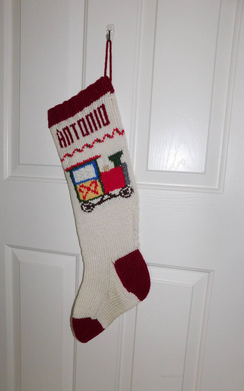 cream knitted christmas stocking
