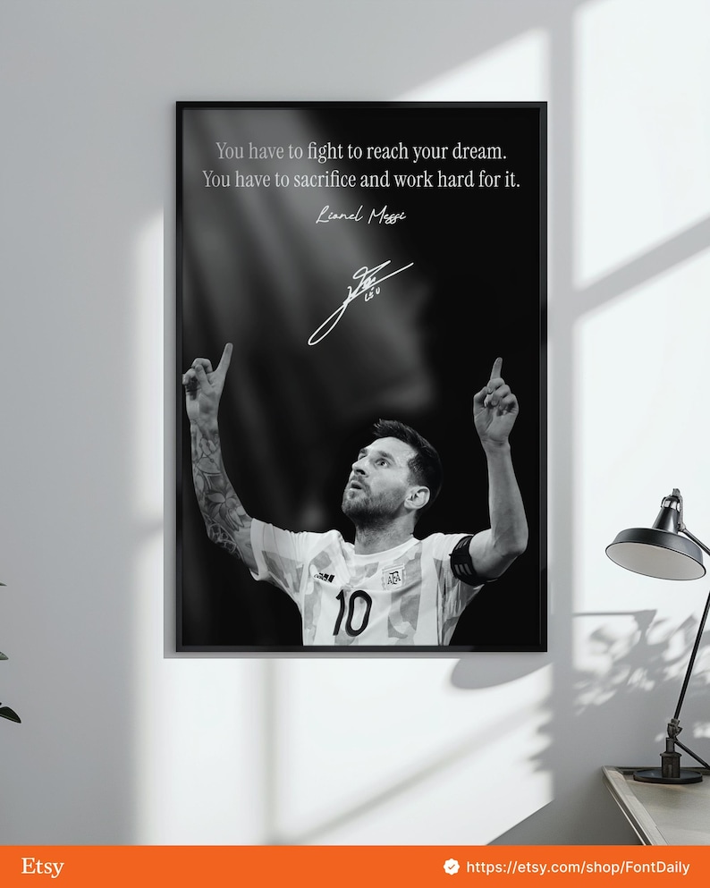 May include: Black and white framed print featuring Lionel Messi, with the text "You have to fight to reach your dream. You have to sacrifice and work hard for it." Messi is wearing a soccer jersey with the number 10.