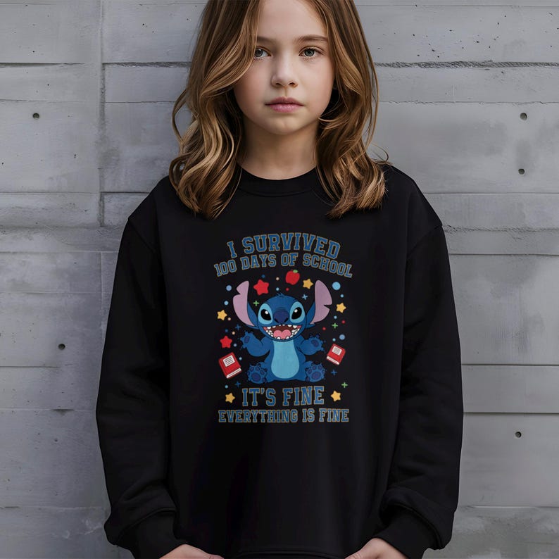 a young girl wearing a black sweatshirt with a stitch stitch stitch stitch stitch stitch stitch