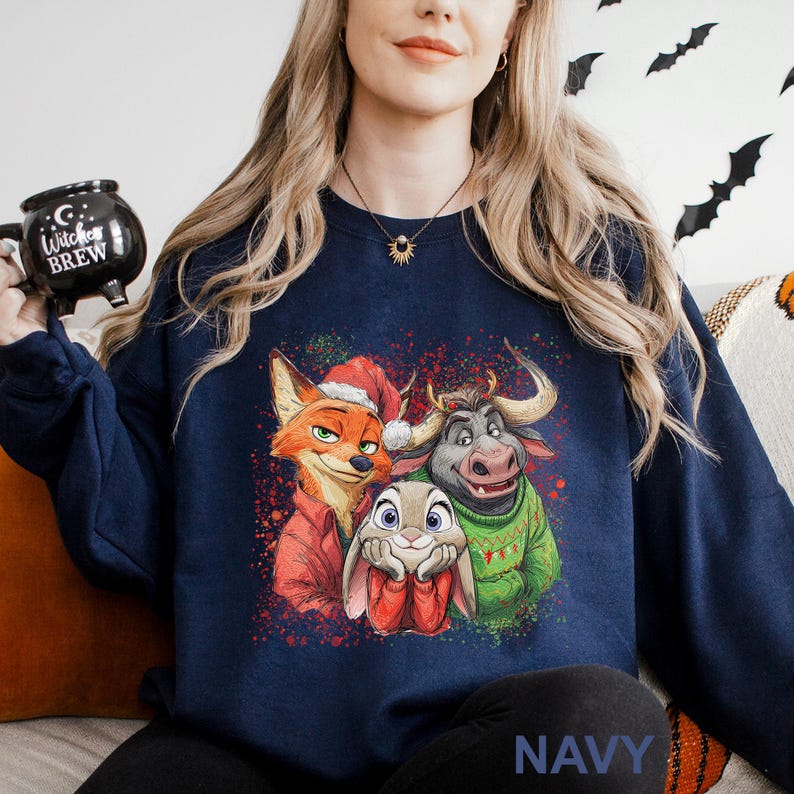 May include: Navy blue sweatshirt featuring a colorful graphic of three animated characters: a fox in a Santa hat, a bunny, and a bull. The sweatshirt has the word "NAVY" printed at the bottom.