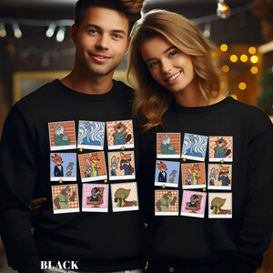 May include: Black sweatshirts featuring a grid of cartoon character portraits. Each portrait is framed with a checkered border and a gold star. The word "BLACK" is printed at the bottom of the sweatshirt.