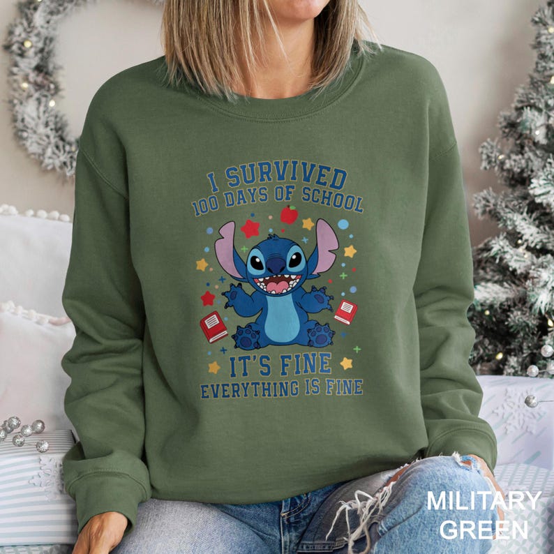 a woman wearing a sweatshirt with a stitch stitch stitch stitch stitch stitch stitch stitch stitch