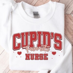 Nurse Cupid Valentine Sweatshirt, Nurse Valentines Day Sweatshirts, Valentine Nurse Shirts, Valentine Nursing Sweater, Nurse Valentine Gift