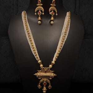 May include: A set of three ceramic mugs with a speckled, matte finish. The mugs are in shades of cream, light gray, and dark gray. Each mug has a simple, minimalist design, perfect for coffee or tea.