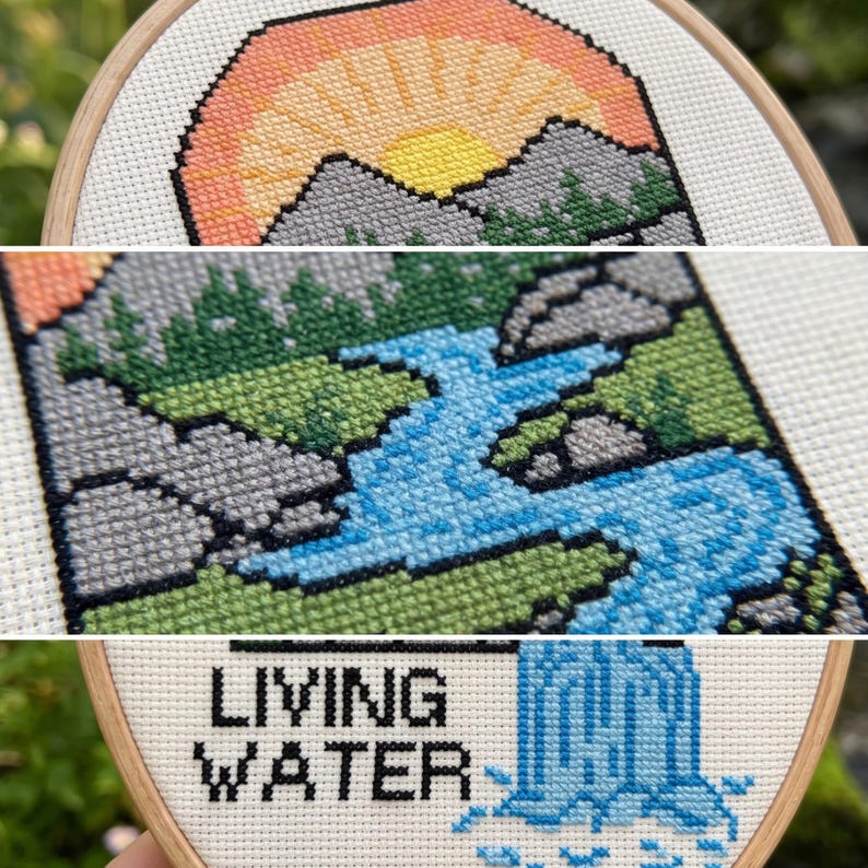 K&ouml;nnte beinhalten: Eine Kreuzstichstickerei in einem Holzrahmen mit einer Landschaft aus gelber Sonne, orangefarbenem Himmel, grauen Bergen, gr&uuml;nen B&auml;umen und einem blauen Fluss. Der untere Teil zeigt einen blauen Wasserfall und den schwarzen Text LIVING WATER.