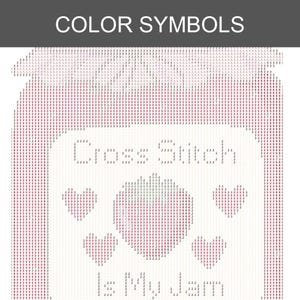 Peut inclure: Un mod&egrave;le de point de croix imprim&eacute; sur une grille blanche avec le texte "Cross Stitch is My Jam" en lettres noires. Le motif comprend un graphique central de fraise et quatre c&oelig;urs environnants, compos&eacute;s de symboles de couleur alphanum&eacute;riques.