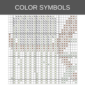 May include: A cross-stitch pattern chart titled COLOR SYMBOLS, featuring a grid layout with black lines. The grid contains repeating symbols including green stars, black whale icons, brown hearts, brown stair-step shapes, and green arrows.