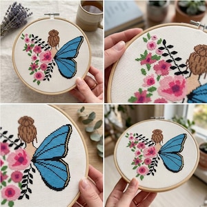Peut inclure: Un projet de broderie au point de croix dans un tambour en bois rond repr&eacute;sentant une personne avec un chignon brun, une grande aile de papillon bleue et un bouquet de fleurs roses avec des tiges feuillues noires sur un tissu blanc.