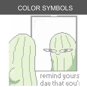 May include: A cross-stitch pattern chart titled COLOR SYMBOLS featuring a green cactus character looking into a rectangular mirror. The design includes the partial text "remind yours day that you'" rendered in a pixelated font style with heart icons.