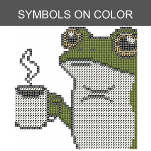 Puede incluir: Un patr&oacute;n de punto de cruz que muestra una rana verde sosteniendo una taza humeante. El dise&ntilde;o utiliza una cuadr&iacute;cula de s&iacute;mbolos sobre color para representar la cabeza, el cuerpo y la taza. El texto SYMBOLS ON COLOR aparece en blanco sobre una barra gris.