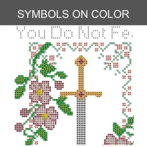 May include: A cross-stitch pattern featuring a central sword with a gold hilt and black blade, surrounded by pink flowers and green leaves. The text "YOU DO NOT FE" is visible at the top, and the header reads "SYMBOLS ON COLOR" in white text.