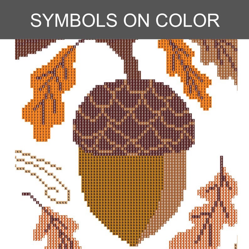 May include: A diamond painting pattern featuring a large central acorn with a dark brown textured cap and a light brown body, surrounded by orange and brown oak leaves. The design includes grid squares with numbers and letters as symbols.