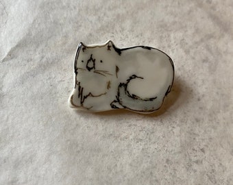 White cat sleeping - a porcelain brooch