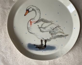 The swan and a forget-me-not - a porcelain plate