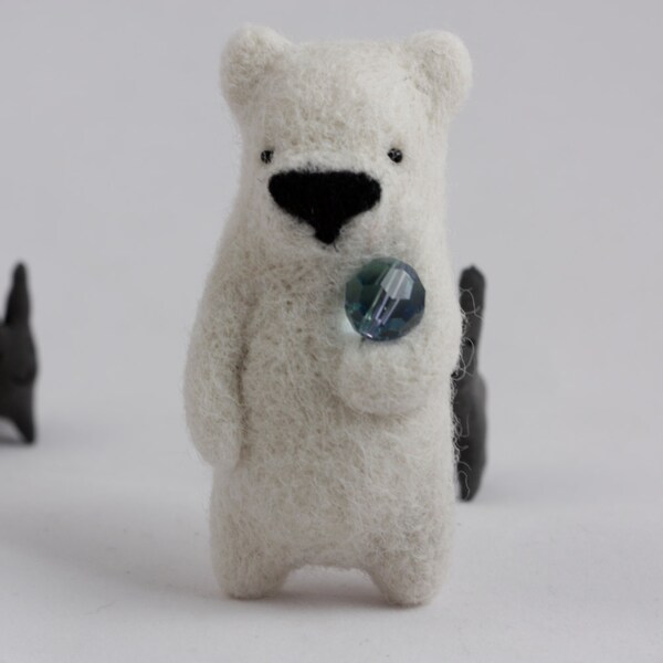 A white bear brooch