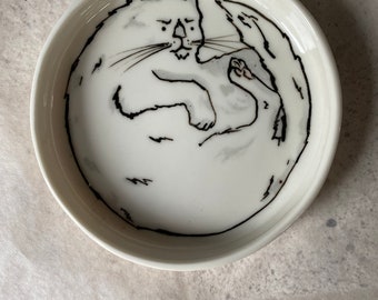 Playing kitty - a small plate