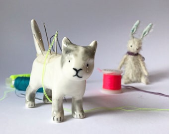 POrcelain cat sculpture pincusion