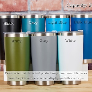 May include: A collection of 20 oz insulated tumblers in various colors, including black, navy, light blue, dark blue, army green, gray, and white. Each tumbler has a silver rim and lid. Text on the image indicates the capacity and color names.