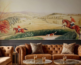 May include: A room featuring a mural of a fox hunt scene above a brown leather sofa and matching armchair. Two round marble-topped tables with gold legs sit in front of the sofa. Decorative pillows and a patterned rug complete the scene.