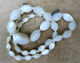 A String of Milky White Graduated Beads