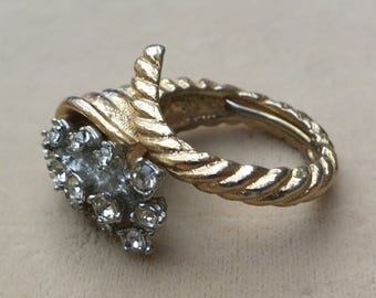 A Costume Cocktail Ring in Gold and Rhinestones