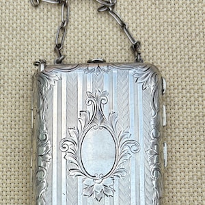 An Antique Sterling Silver Compact Purse...Art Nouveau Floral Pattern