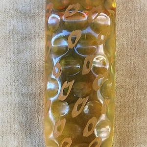 A Unique Transluscent Applejuice Bakelite Clip