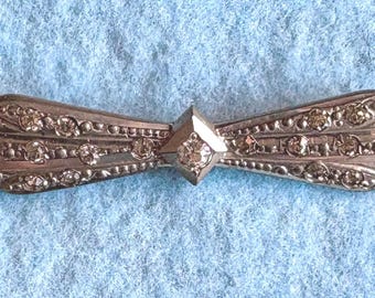 An Antique Art Deco Bar Brooch in Silver Tone and Paste Stones