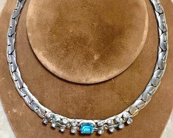 A Vintage Costume Silver Tone Choker with a Blue Emerald Cut Stone
