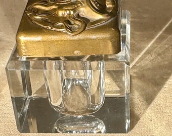An Antique Art Nouveau Inkwell in Heavy Cut or Molded Glass with a Bronze or Brass Lid with a Face Motif of a Mute or Spirit