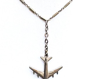 A Silver Tone Watch Chain with a Dog Clip, Circle Clasp and a Boeing 707 "Fob"