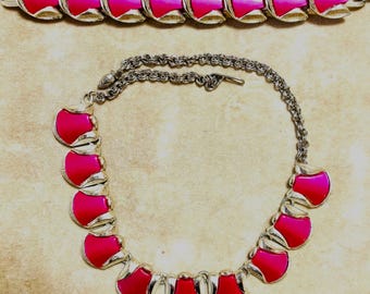 A Mid Century Thermoset Plastic Necklace and Bracelet Set In Pink and Silver Tone