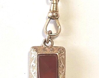 A Vintage Gold Filled Watch Fob in Carnelian and Onyx on a Gold Filled Dog Clip...Hanging on a Gold Filled Chain